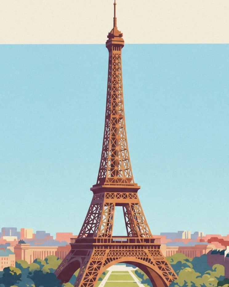 The tour Eiffel with its ochre girders against the blue sky above the rooftops of Paris