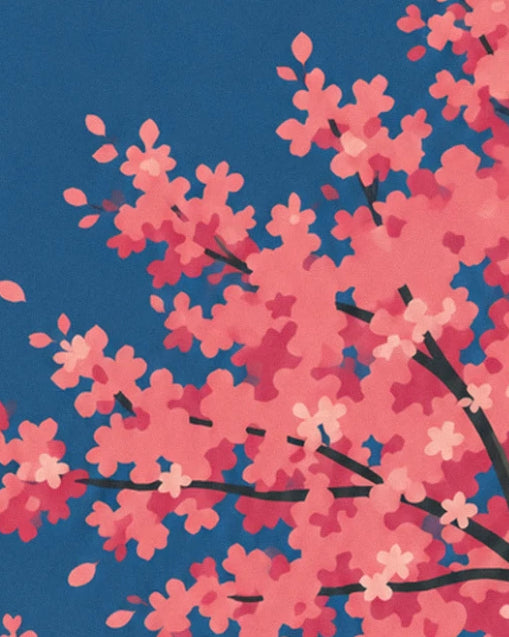 A cherry branch laden with pink blossoms against the midnight blue sky