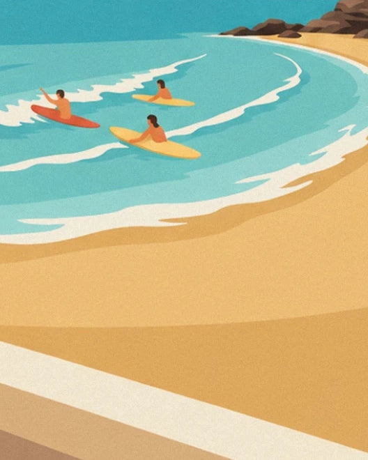 The 3 surfers on their red and yellow boards, in the bay lined with rocks