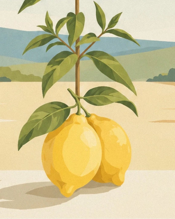 Les 2 citrons jaunes sous leurs feuilles vertes, devant des collines bleutées