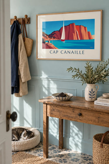 Poster of a sailboat at the foot of the red cliffs of Cap Canaille: framed on the wall