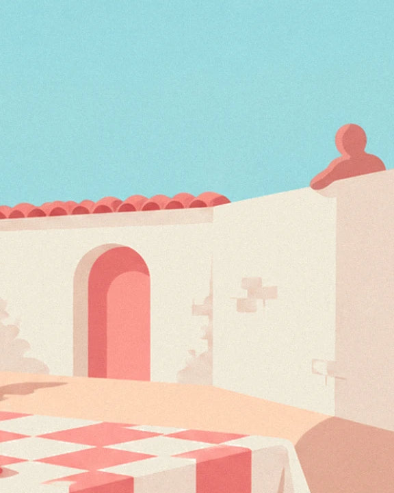 The white wall with a pink arched door beneath the roof tiles, beside the checked tablecloth