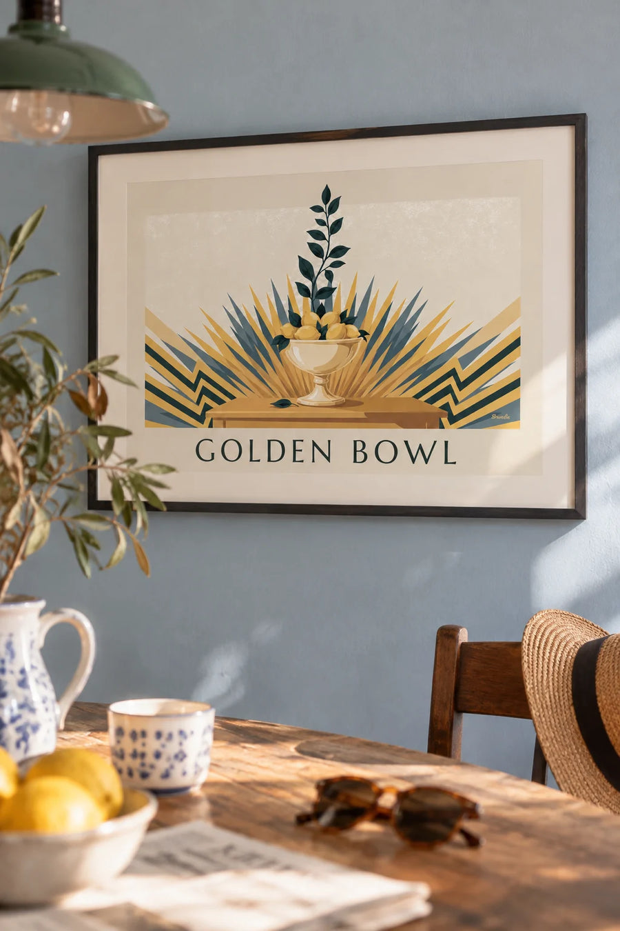 Poster of a fruit bowl filled with lemons and geometric patterns: framed on the wall