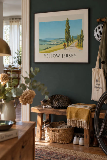 Poster of a cyclist in a yellow jersey on a country road: framed on the wall