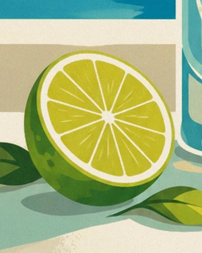 Half a lime with bright yellow flesh beside green leaves