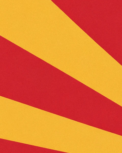 Une alternance de larges rayons rouges et jaunes à la texture granuleuse