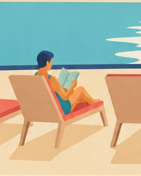A woman reading in turquoise swimwear on a sun lounger beside the pool