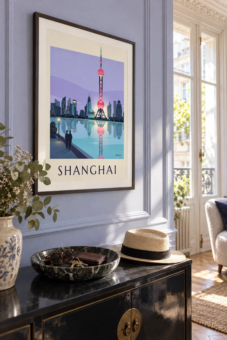 Poster of the Oriental Pearl Tower in Shanghai at night: framed on the wall