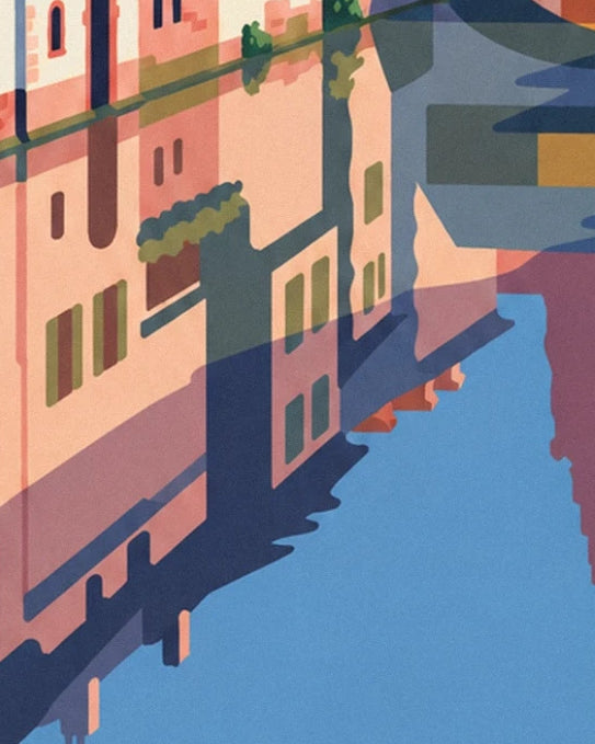 Pink reflections of façades with green shutters in the blue canal water