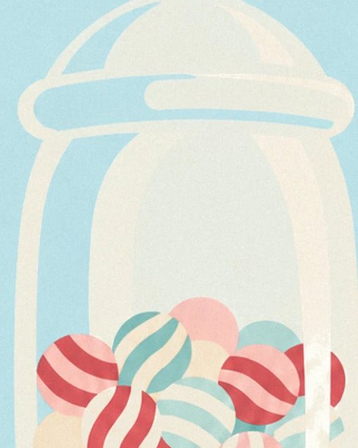 The rounded glass jar lid above the multicoloured sweets