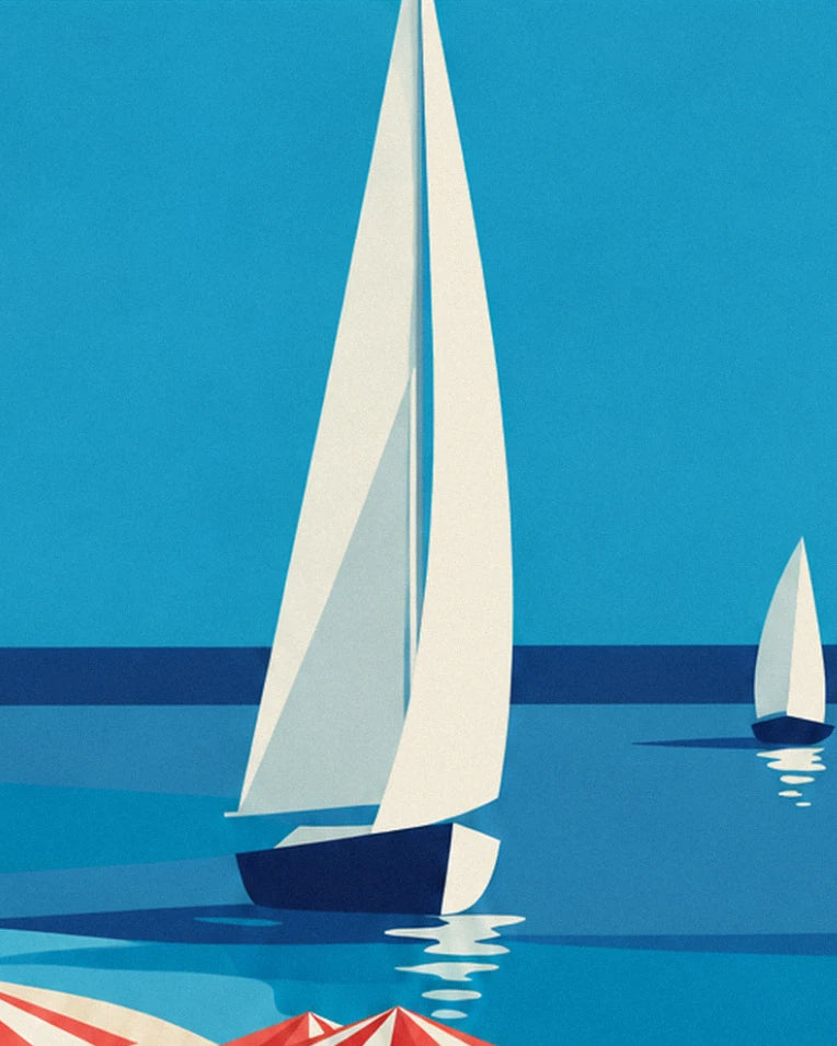 Le grand voilier blanc à la coque bleu marine, un second voilier au loin sur la mer