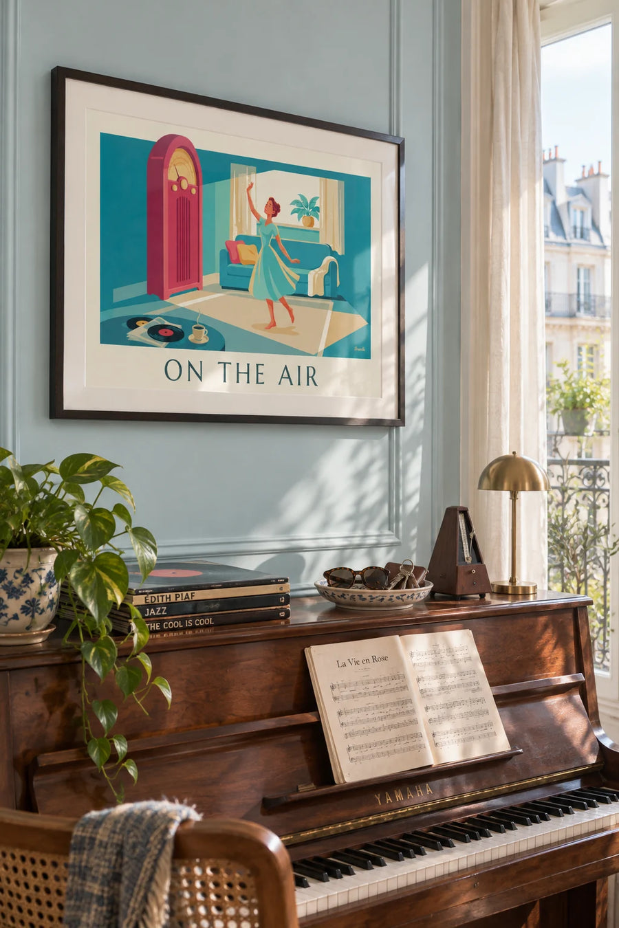 Woman dancing next to a pink radio poster: framed on the wall