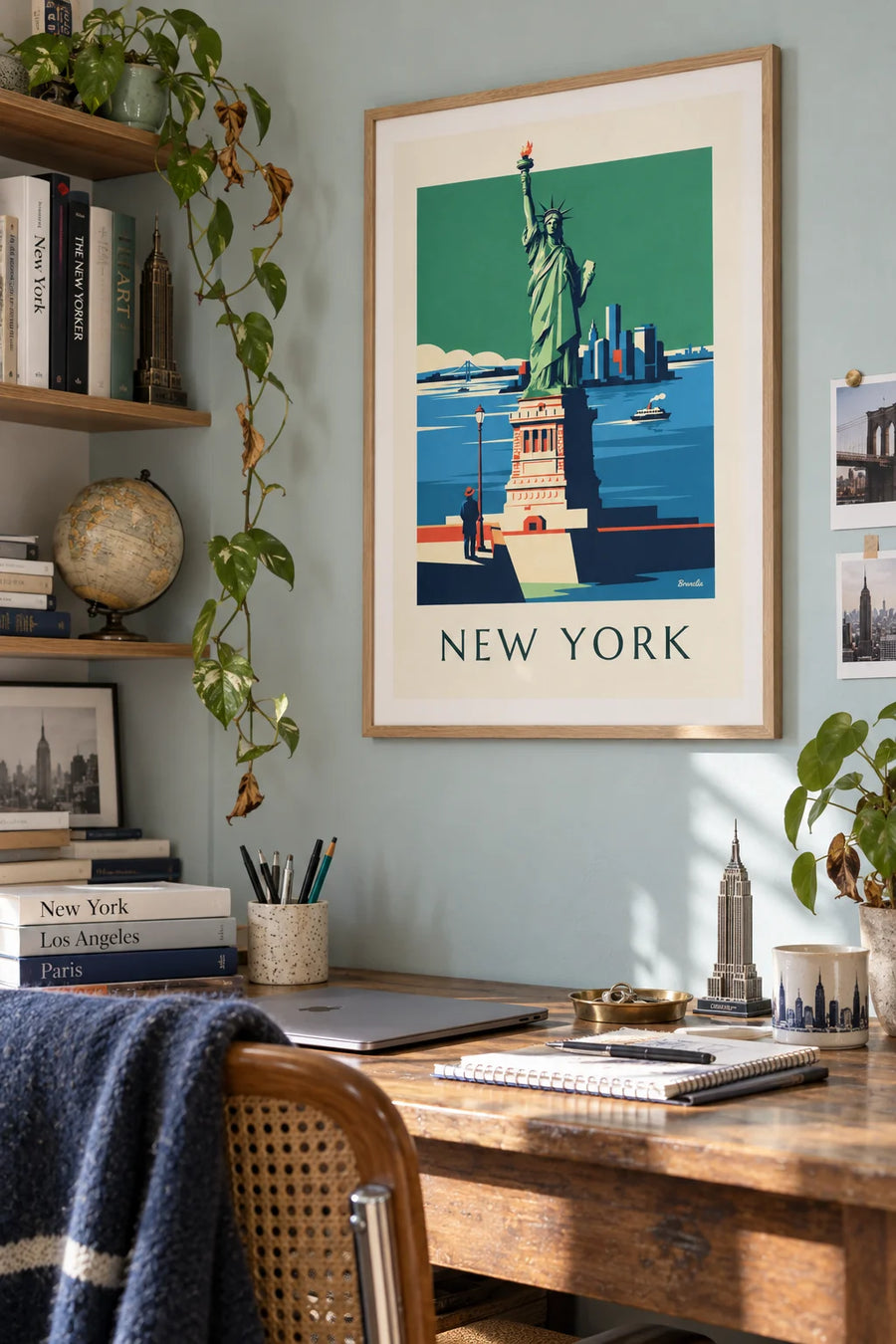 Poster of the Statue of Liberty and the Manhattan skyline in New York: framed on the wall