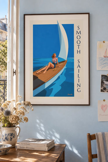 Poster of a pin-up on the deck of a sailboat out at sea: framed on the wall