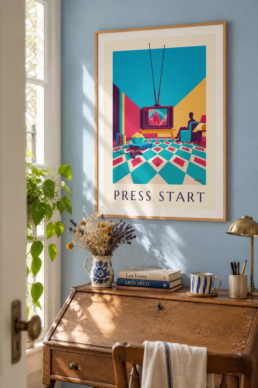 Poster of a video game console and friends holding controllers: framed on the wall