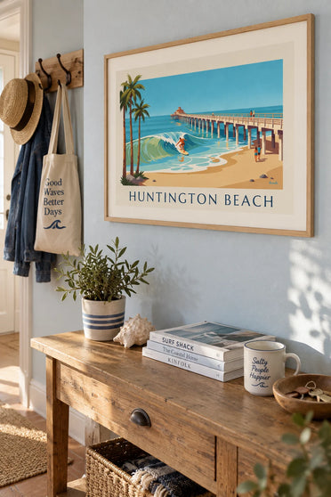 Poster of a surfer under the Huntington Beach pier in California: framed on the wall