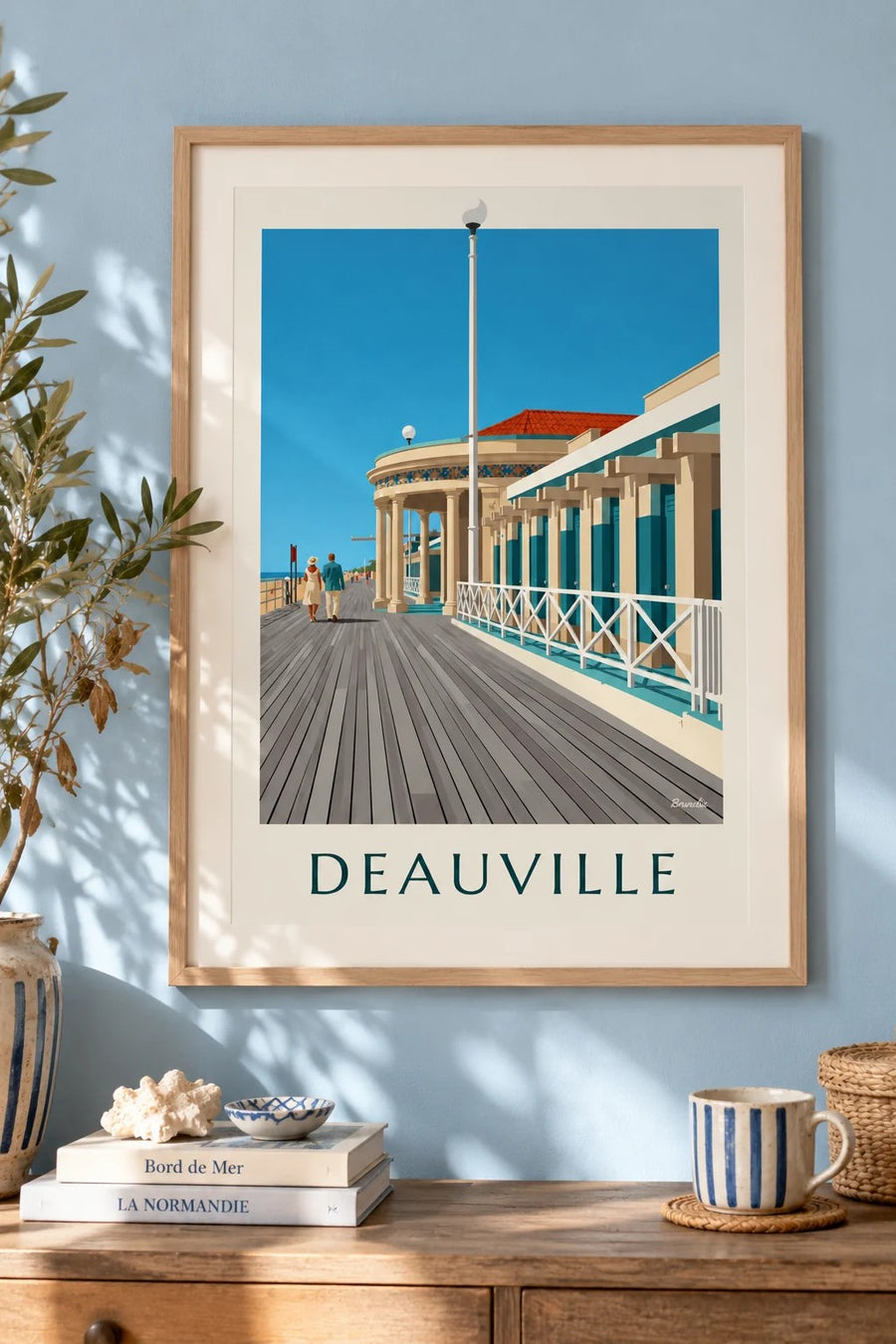 Plakat med Deauvilles Les Planches og Bains Pompéiens : indrammet på væggen