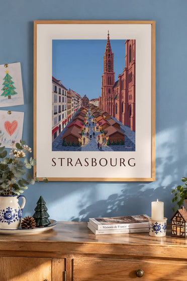 Plakat med julemarkedet i Strasbourg : indrammet på væggen