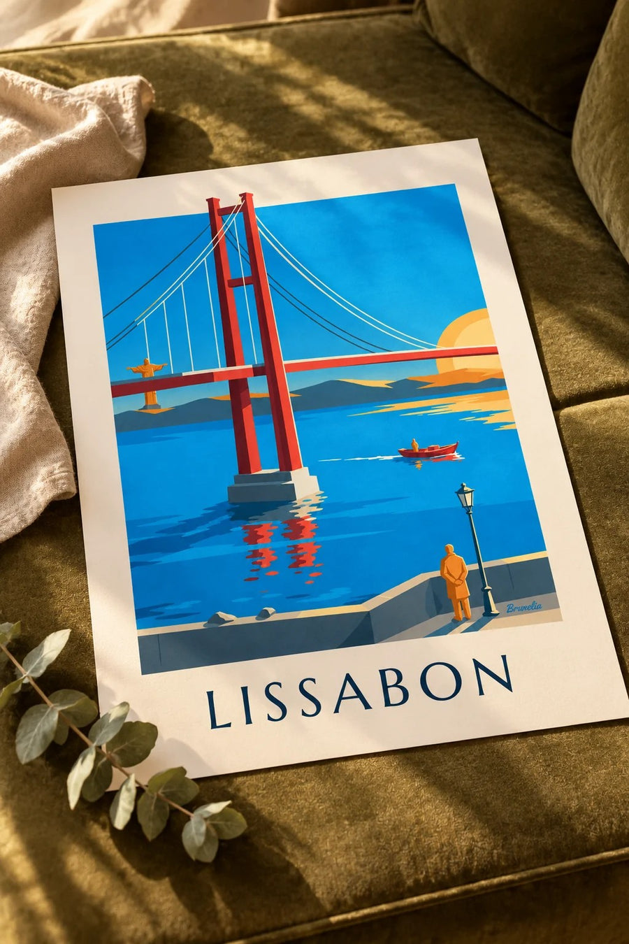 Plakat med 25 de Abril-broen over Tejo i Lissabon: lagt fladt på et bord