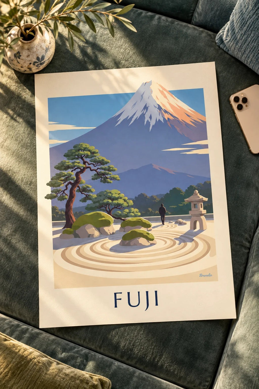Plakat med japansk zenhave foran Fuji-bjerget: på et bord