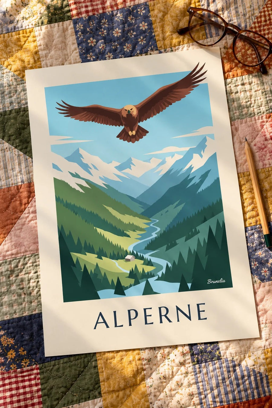 Plakat med kongeørn over en dal i Alperne: lagt fladt på et bord