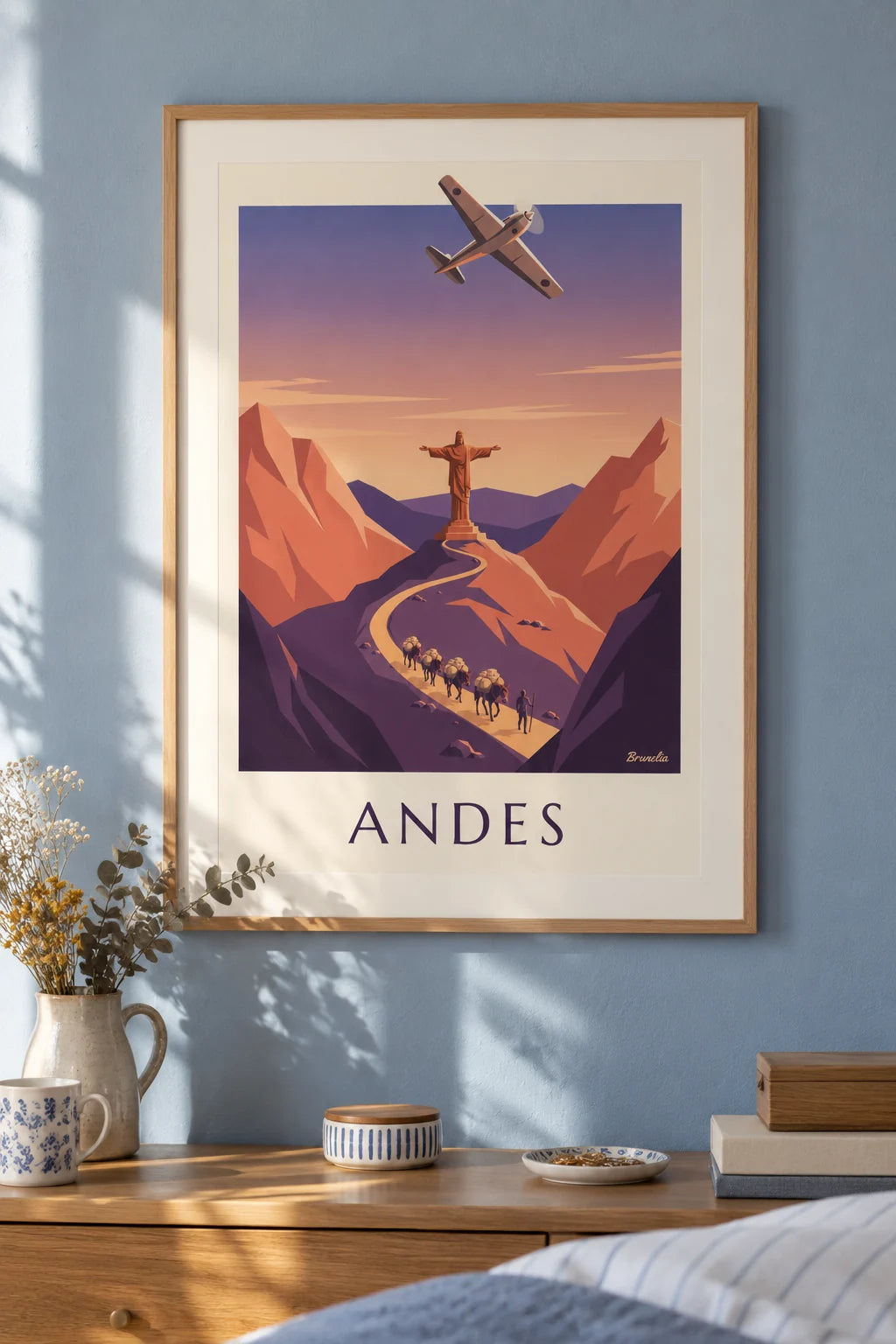 Airmail plane and Andes mule caravan poster on the wall