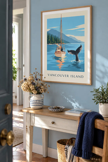 Poster of a whale tail near a sailboat off Vancouver Island: framed on the wall