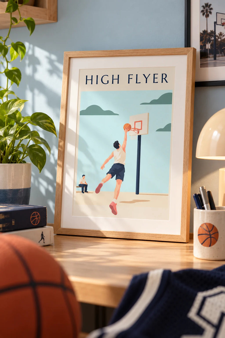 Plakat med basketballspiller, der letter mod kurven til en dunk: lille A4 i ramme