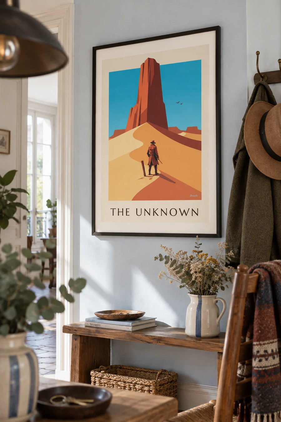 Poster of a mysterious adventurer on a desert ridge: framed on the wall