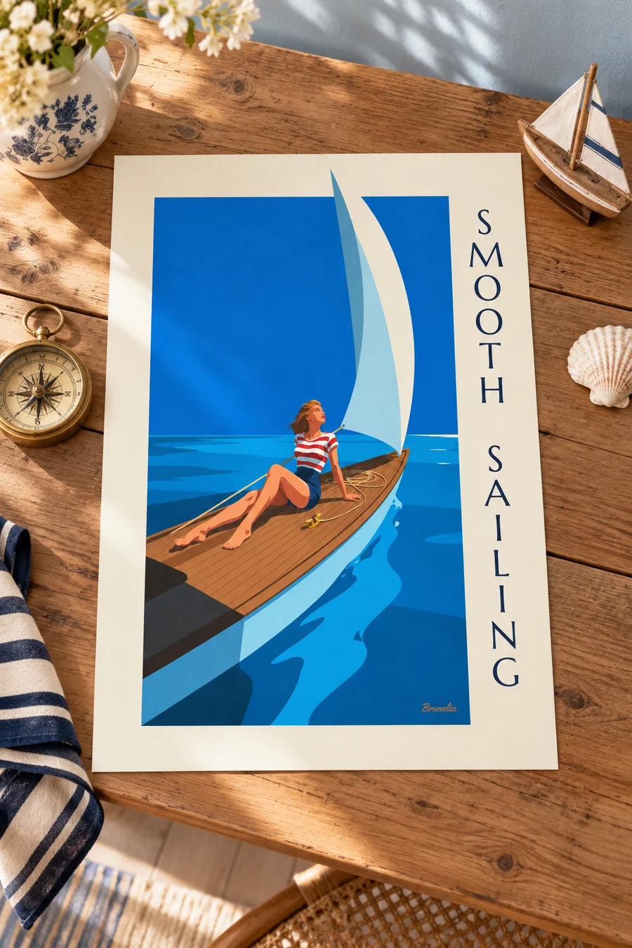 Plakat med pin-up på dækket af en sejlbåd på åbent hav: stillet på et bord