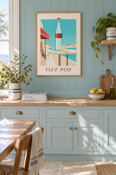 Poster of a sparkling soda bottle with ice cubes and lemon: framed on the wall