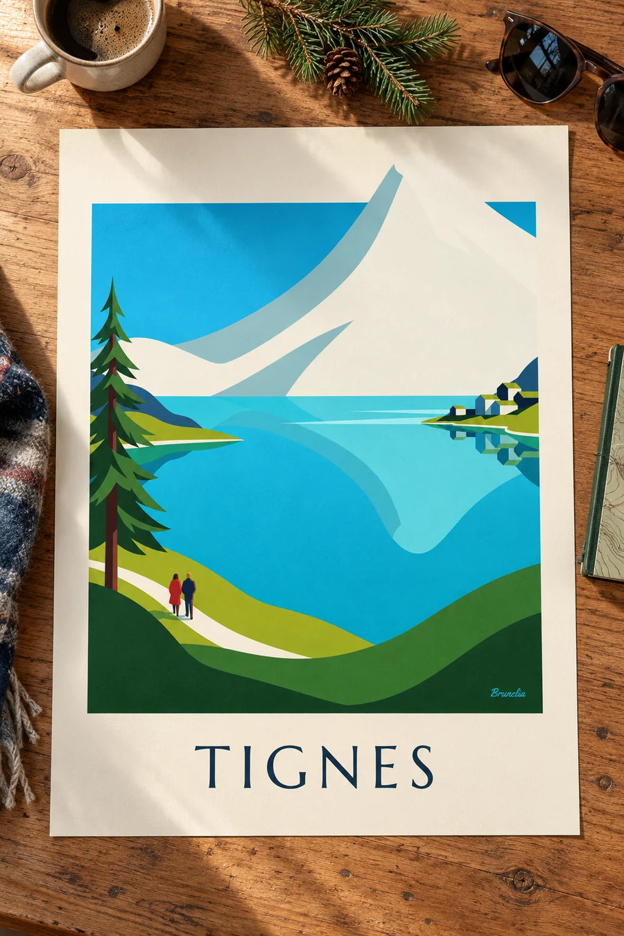 Plakat med Lac de Tignes og de snedækkede tinder ved Grande Motte: stillet på et bord
