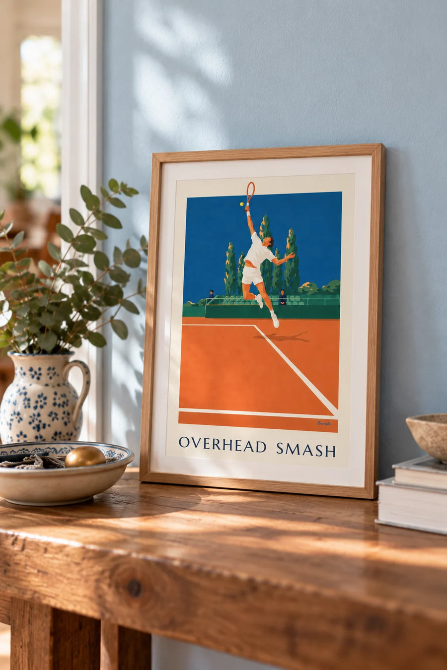 Poster of a tennis player mid-smash on a clay court: small framed A4 size