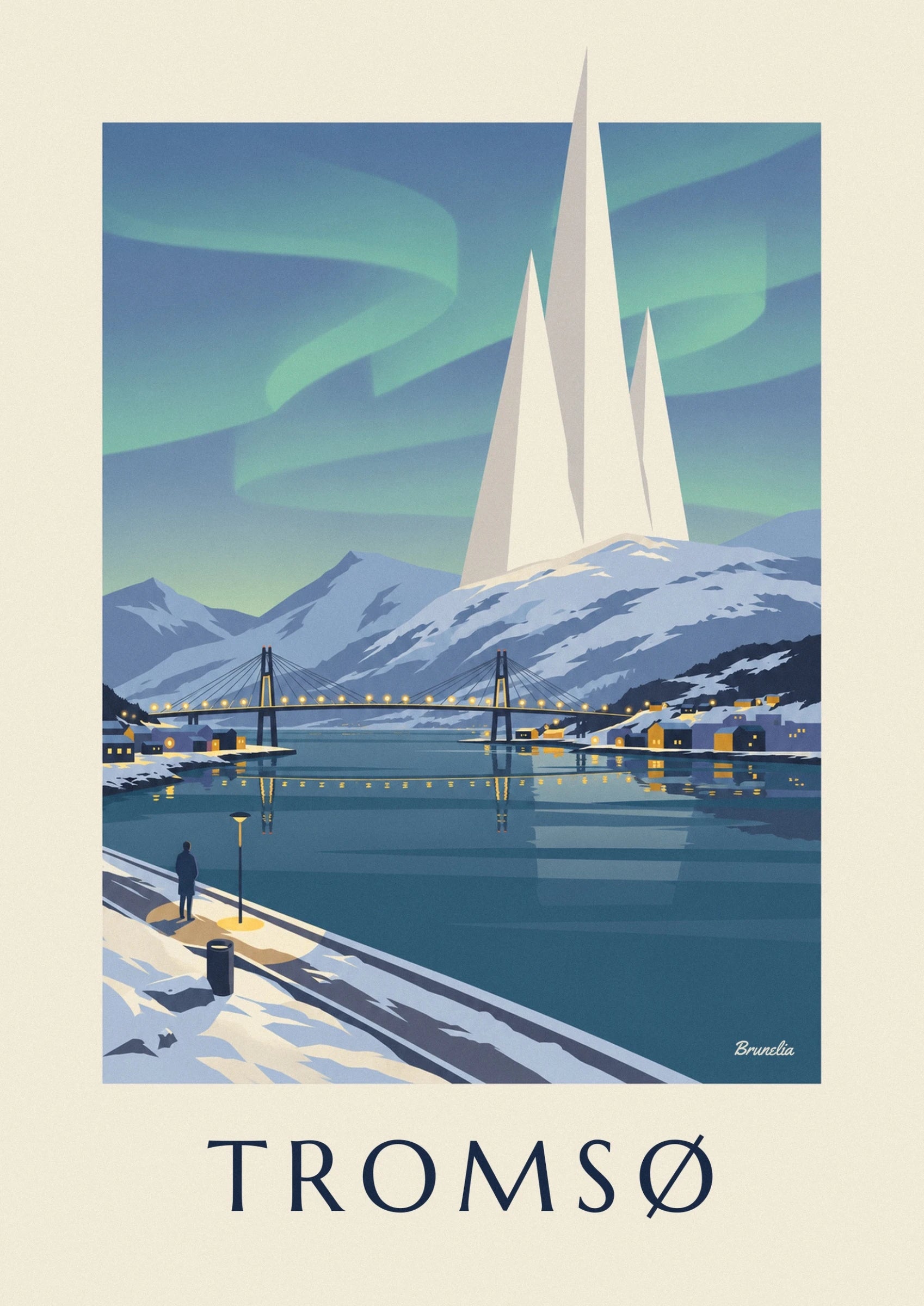 The illuminated bridge over the blue fjord, between snow-covered mountains and houses along the shore