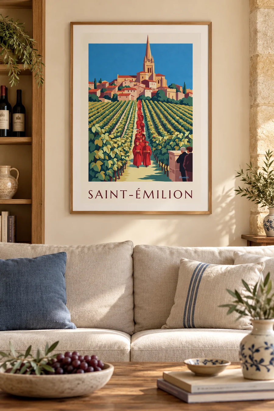 Plakat af vinmarker og landsbyen Saint-Émilion set fra en vinkælder: indrammet på væggen