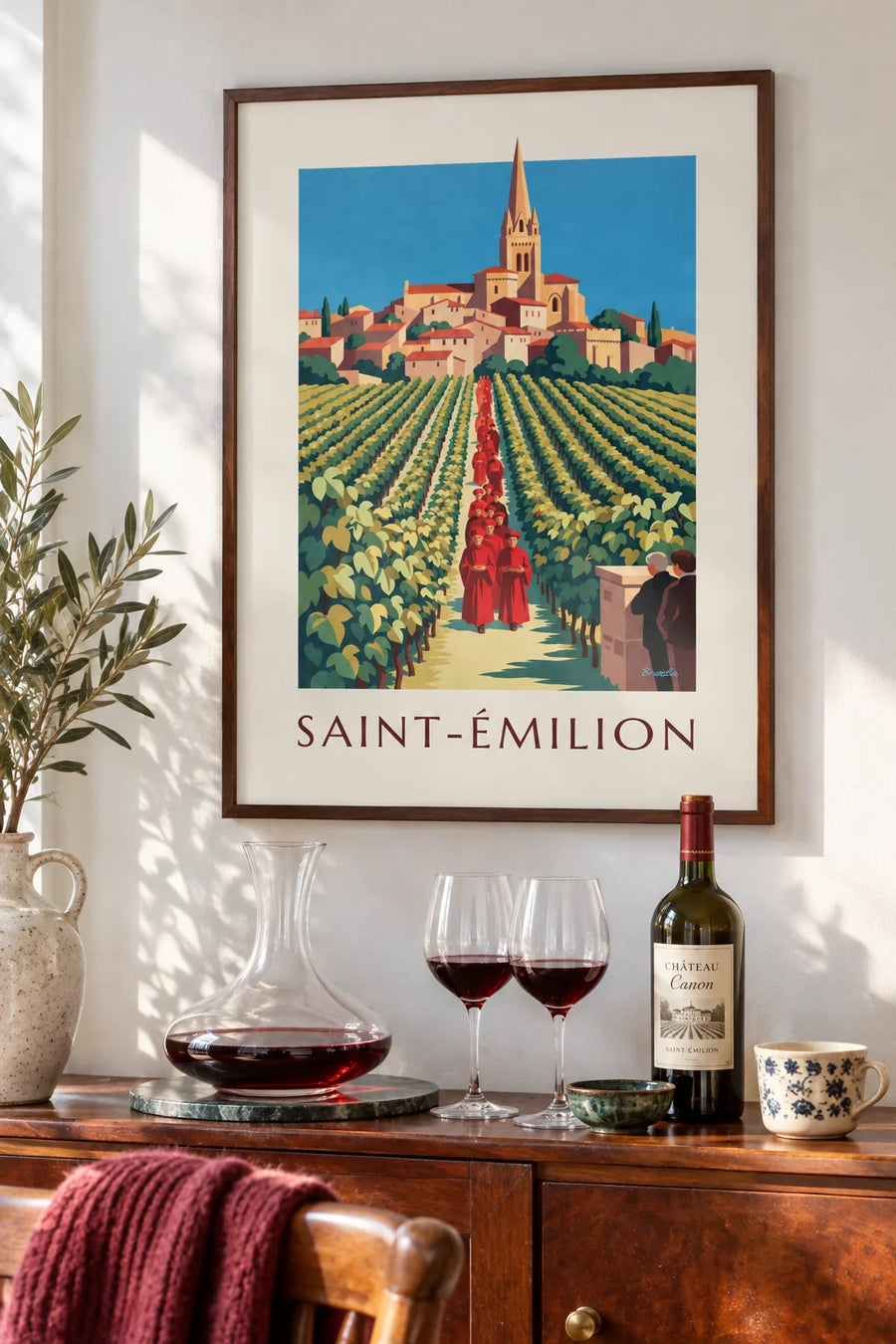 Poster of Saint-Émilion vineyards and village seen from a cellar: framed on the wall