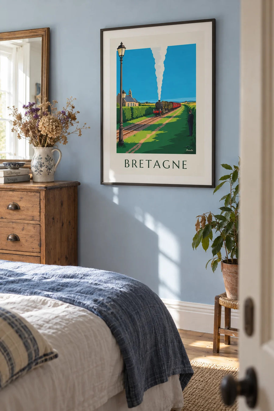 Steam locomotive poster in the Brittany countryside: framed on the wall