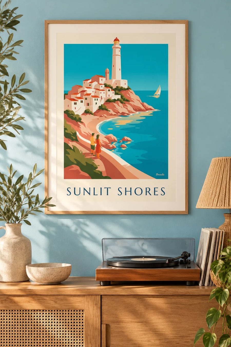 Plakat med middelhavskyst, hvid landsby og fyrtårn: indrammet på væggen